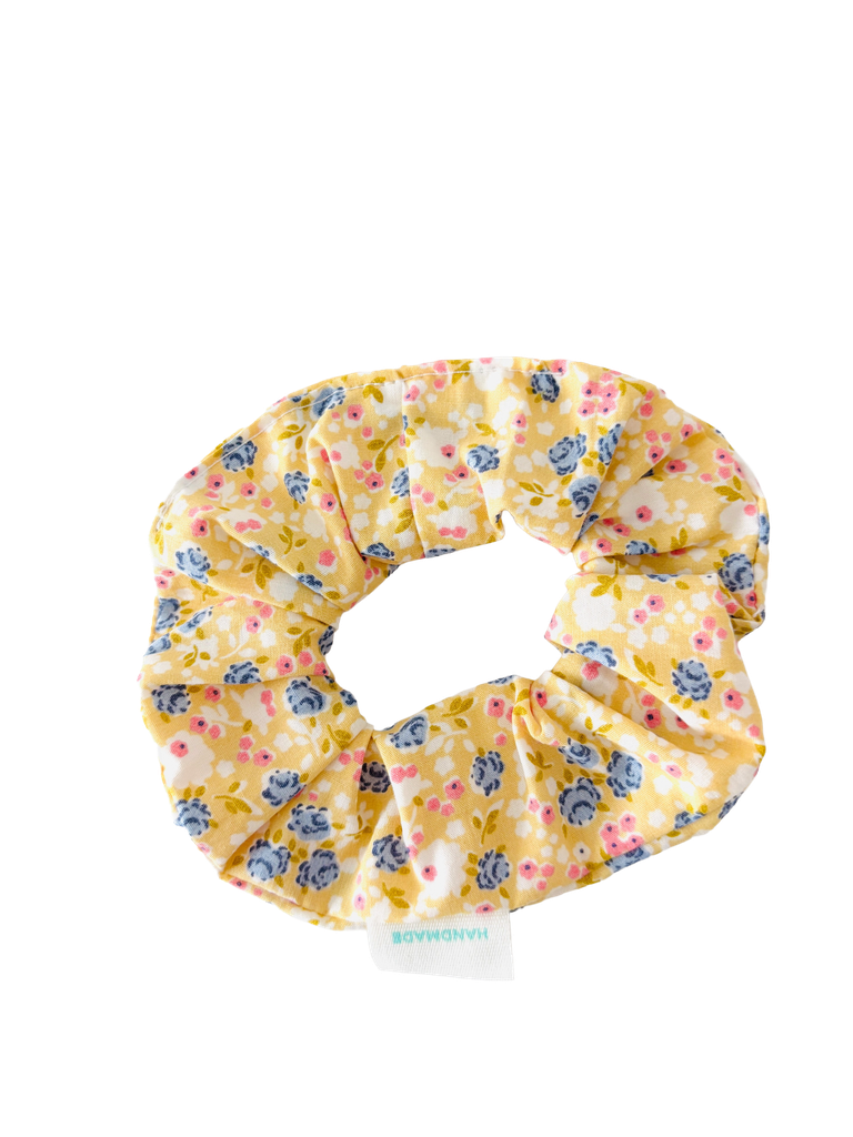 Coletero flores amarillo