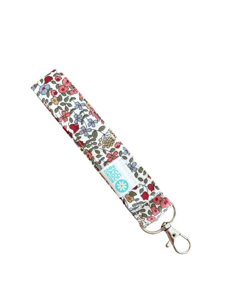 Llavero flores Borgoña